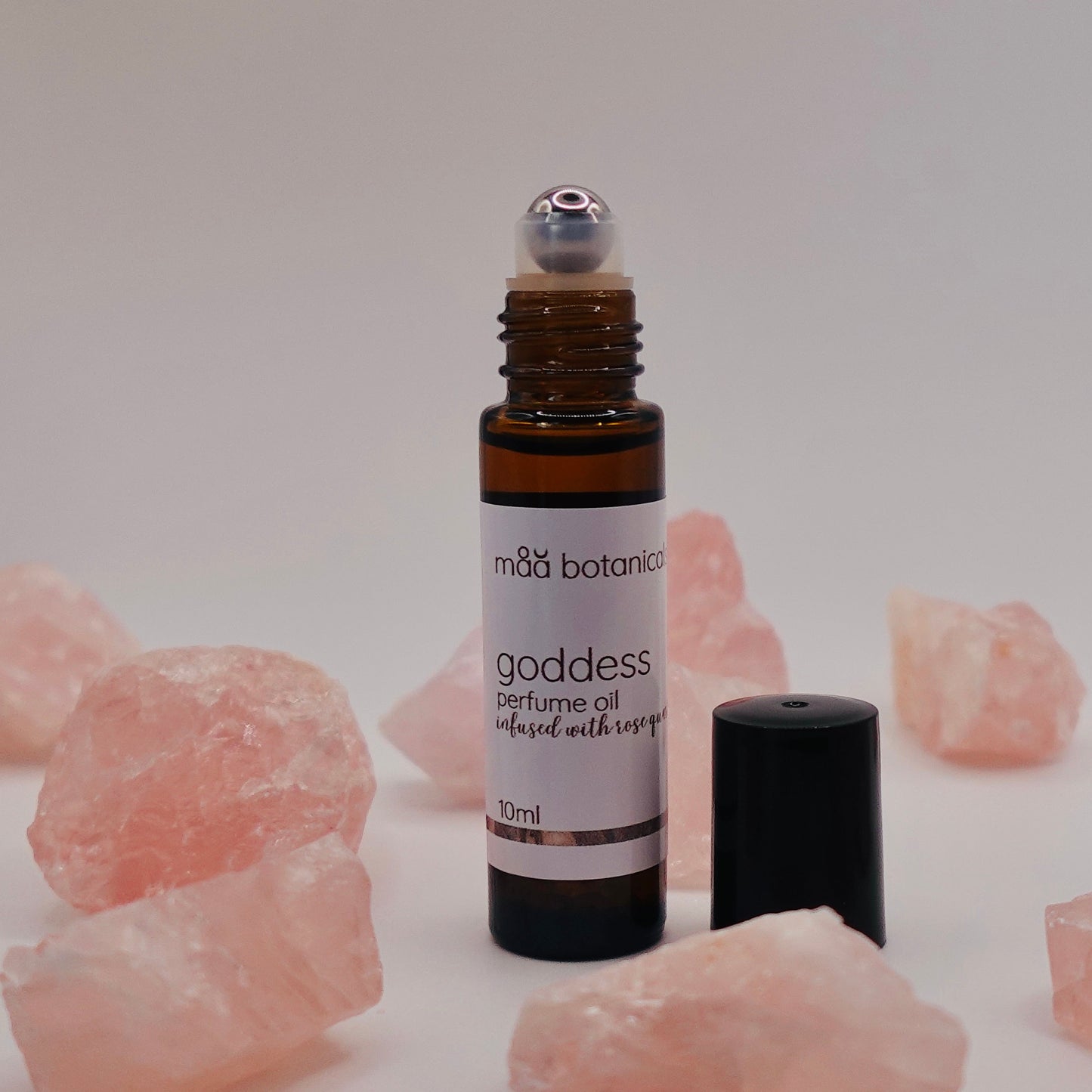 maa botanicals goddess perfume oil by with rose quartz crystals