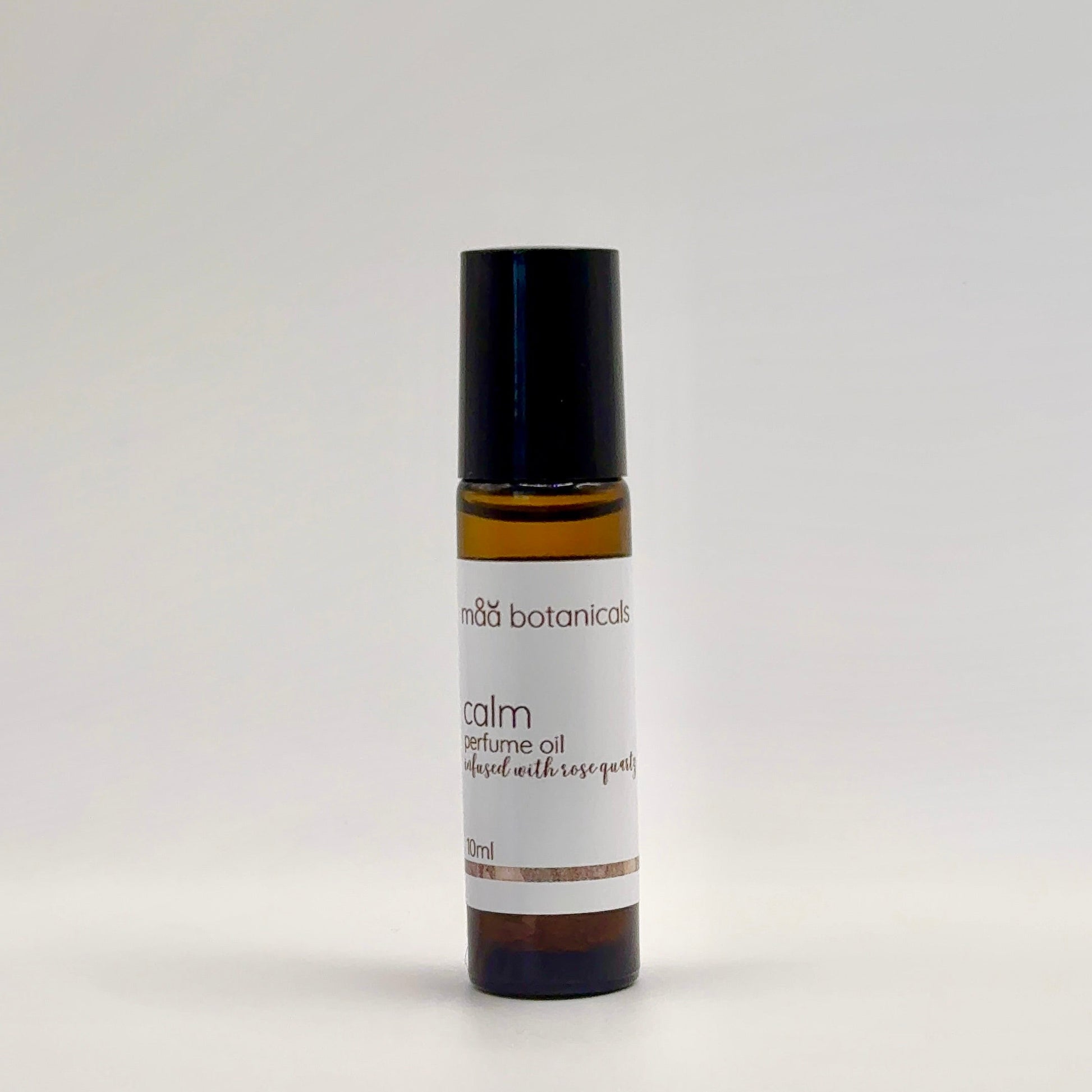 maa botanicals calm perfume oil on a white background